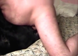 Black dog chocking on that boner