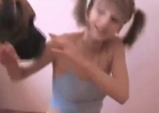 Horny dog fucking a cute teen